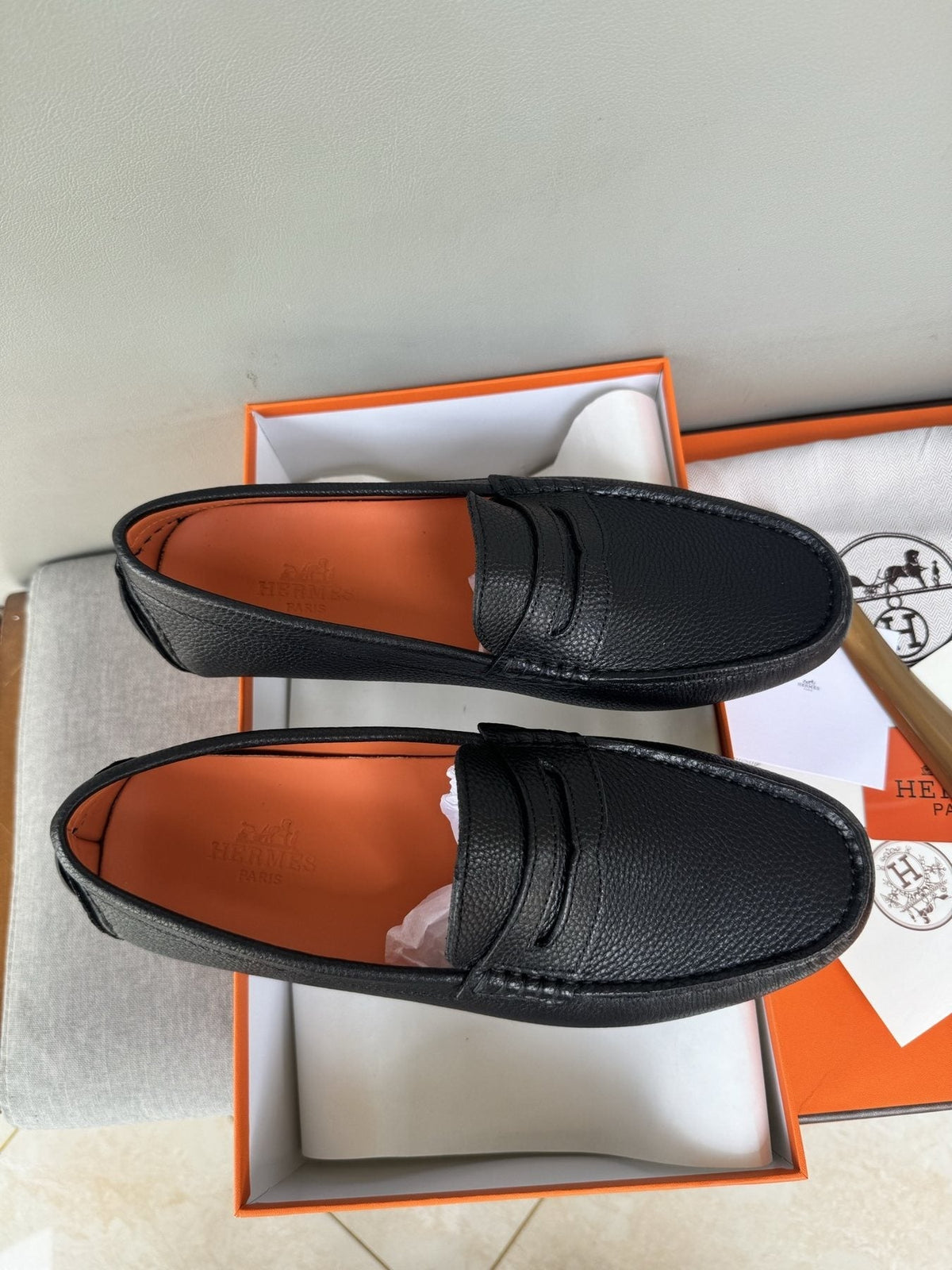 Hermès Black Textured Penny Loafers — front