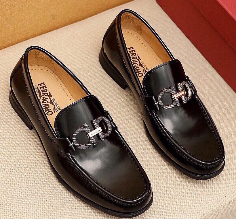 Ferragamo Black Hardware Loafers — hero