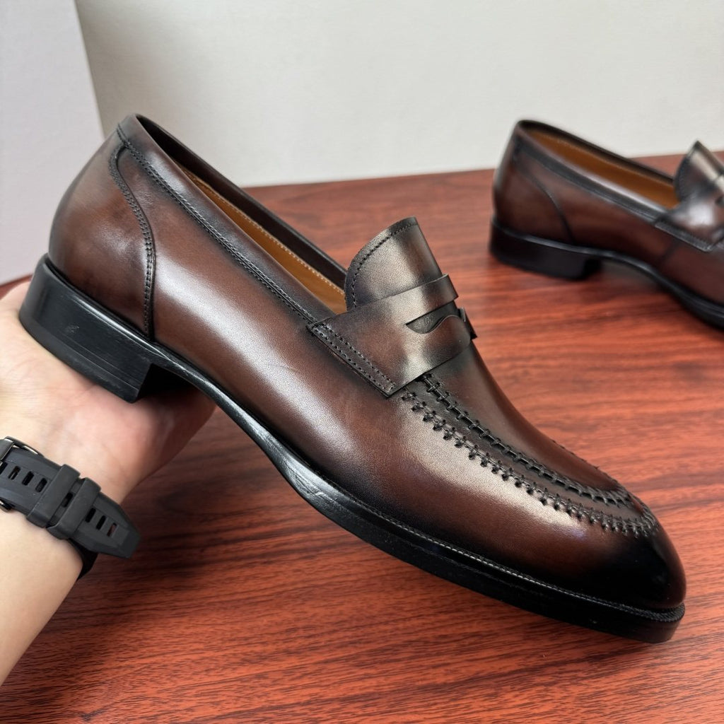 Berluti Burnished Penny Loafers — model
