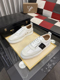 Christian Louboutin Script-Accent Low-Top Sneakers — hero