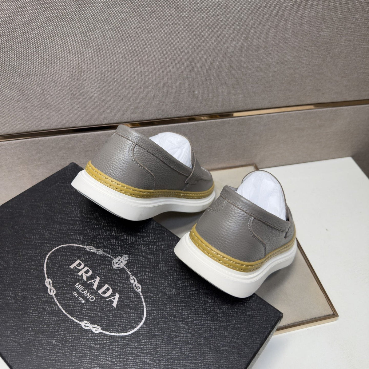 Prada Gold Accent Slip-On Loafers — front