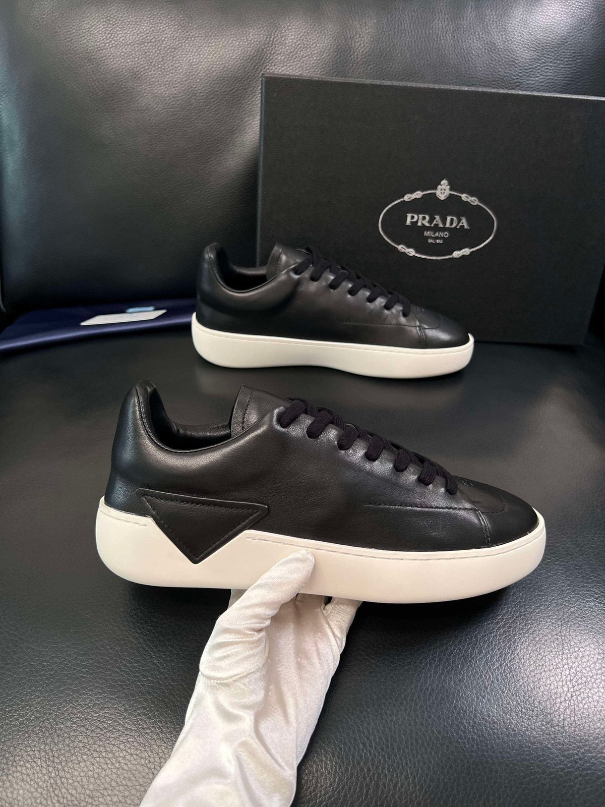 Prada Low-Top Leather Sneakers — side